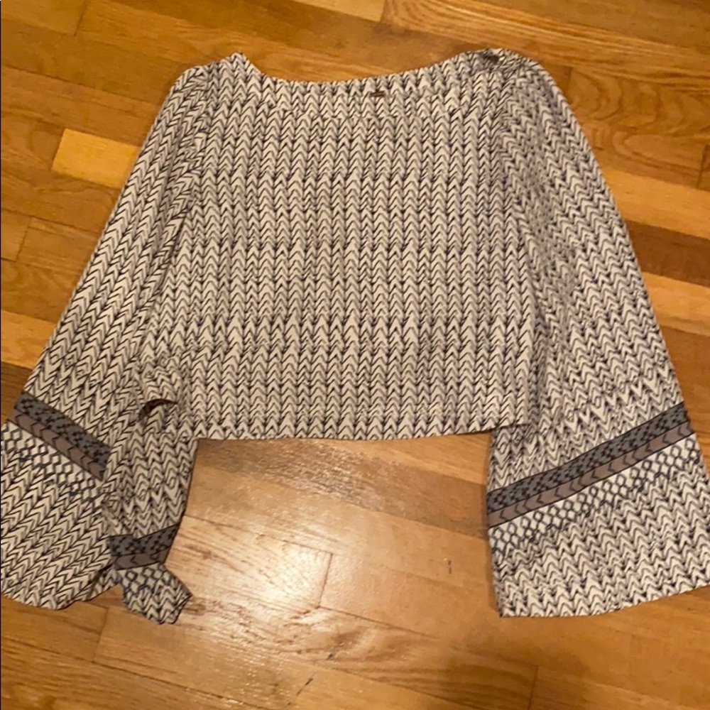 Flowy patterned bell sleeve top